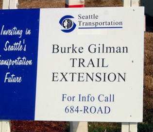 SDOT sign from the late 1990s along the Missing Link the diagonal railroad track on the road Burke-Gilman's infamous missing link still incomplete trail