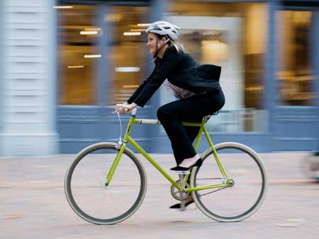 Seattle bicycle lawyer Kelli Bynum an avid cyclist, ironman finisher, former professional bike guide, pictured with her bicycle.