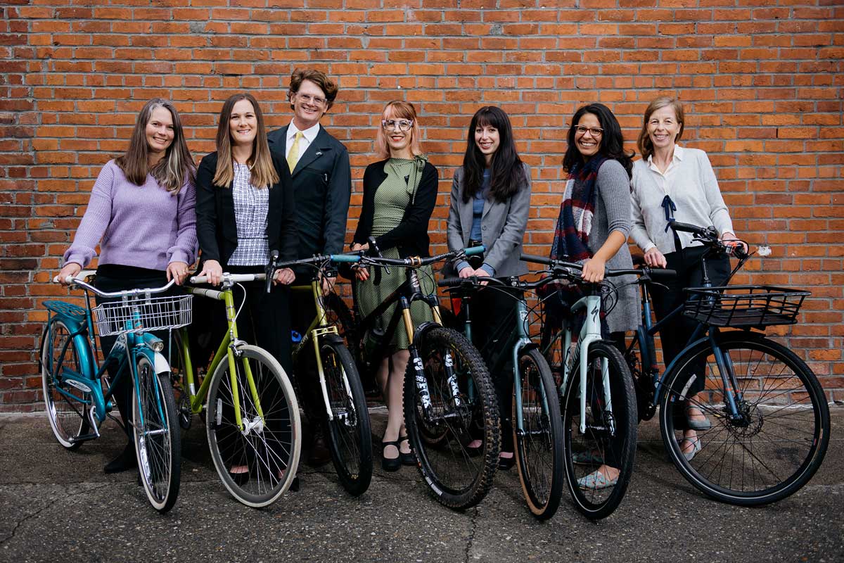 Washington Bike Law attorneys, bicycle ambassador, office manager, paralegals, and office dogs, bike to work at the office with bicycle stuff and bike for fun.
